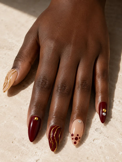 Gilded Burgundy Stripe Press-On Nails - hand1