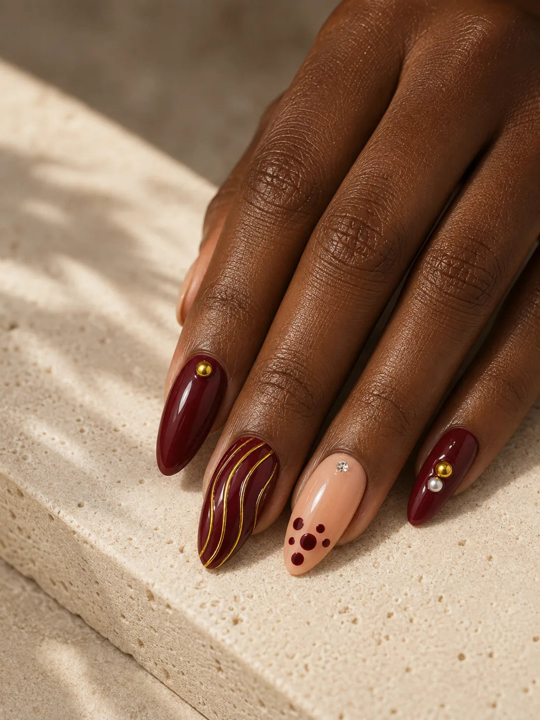 Gilded Burgundy Stripe Press-On Nails - hand2