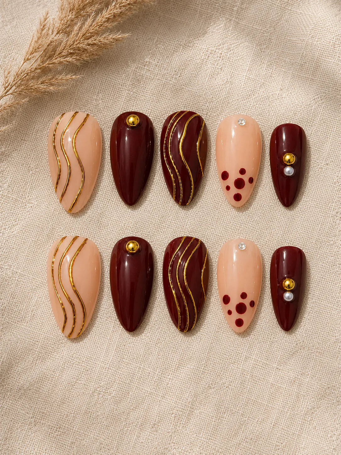 Gilded Burgundy Stripe Press-On Nails - flatlay