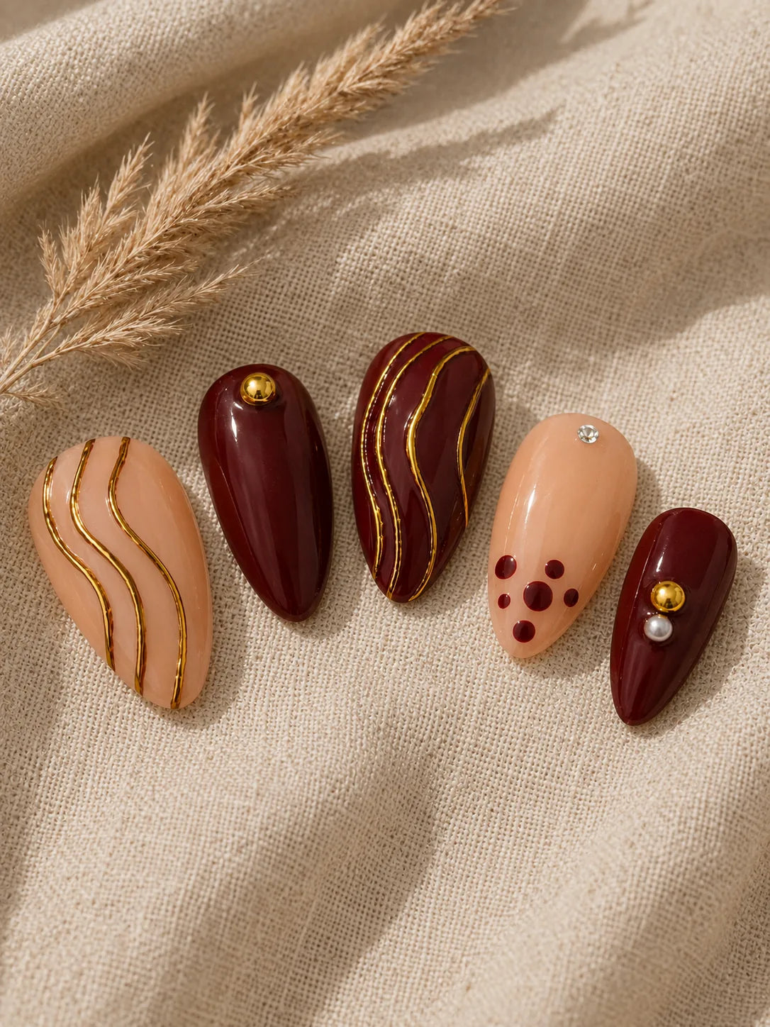 Gilded Burgundy Stripe Press-On Nails - closeup2