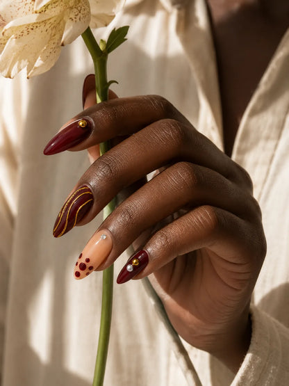 Gilded Burgundy Stripe Press-On Nails - life1