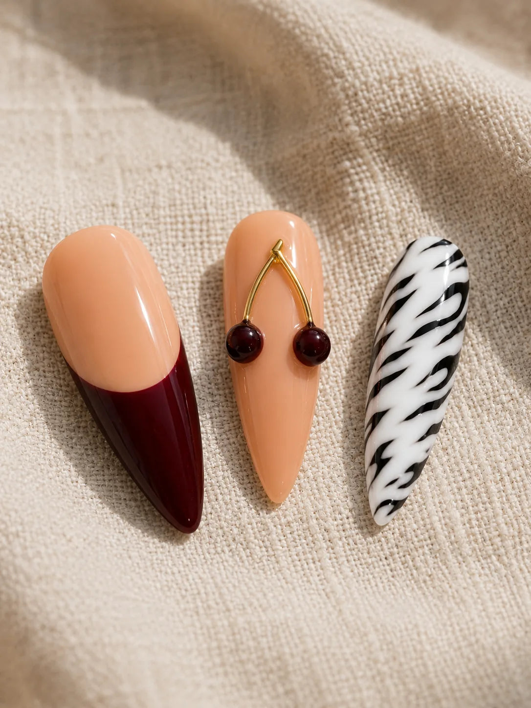 Half Moon Vamp Zebra Cherry Press-On Nails - closeup