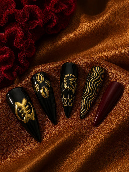 Lion Cowrie - Gold Relief Black Press-On Nails - closeup2