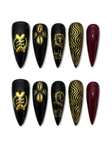 Lion Cowrie - Gold Relief Black Press-On Nails