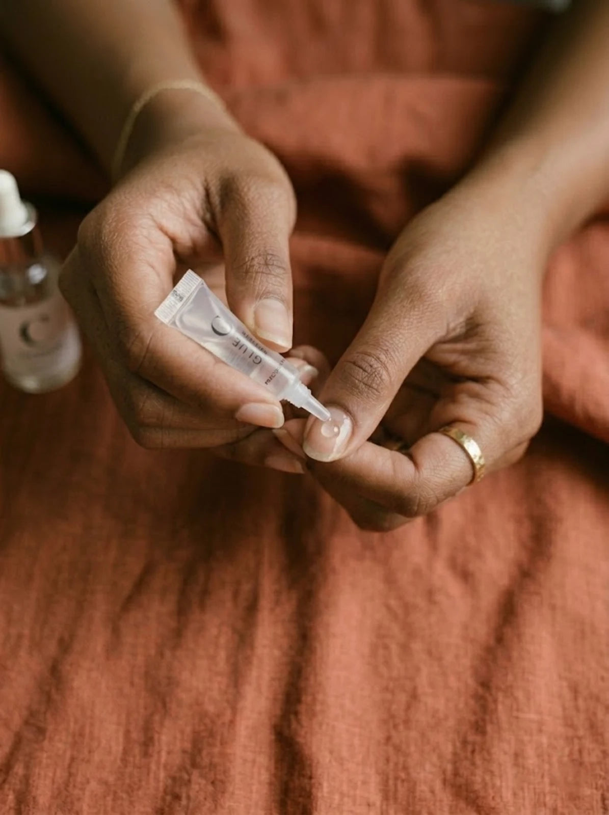 Apply a small drop of nail glue